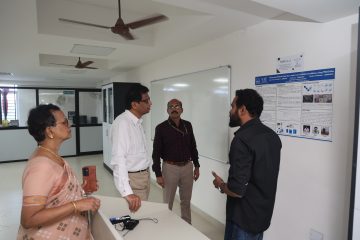 Dr. Sekar Viswanathan listening to the explanation of the vit employee about the drone.