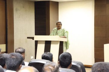 A faculty given a welcome address in the event of welcoming new joining faculties of vit chennai.