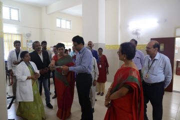 Dr. Indira jayakumar medical director of apollo shine foundation explaining it to Dr. Sekar Viswanathan.