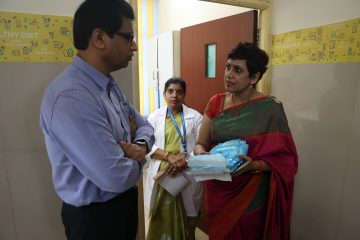 Dr. Indira jayakumar medical director of apollo shine foundation explaining it to Dr. Sekar Viswanathan.