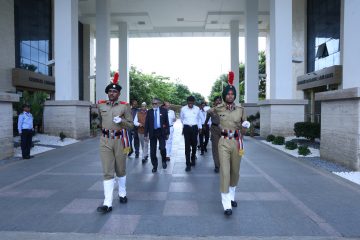 Justice Kalifulla's and Dr. Sekar Viswanathan walking to stage.